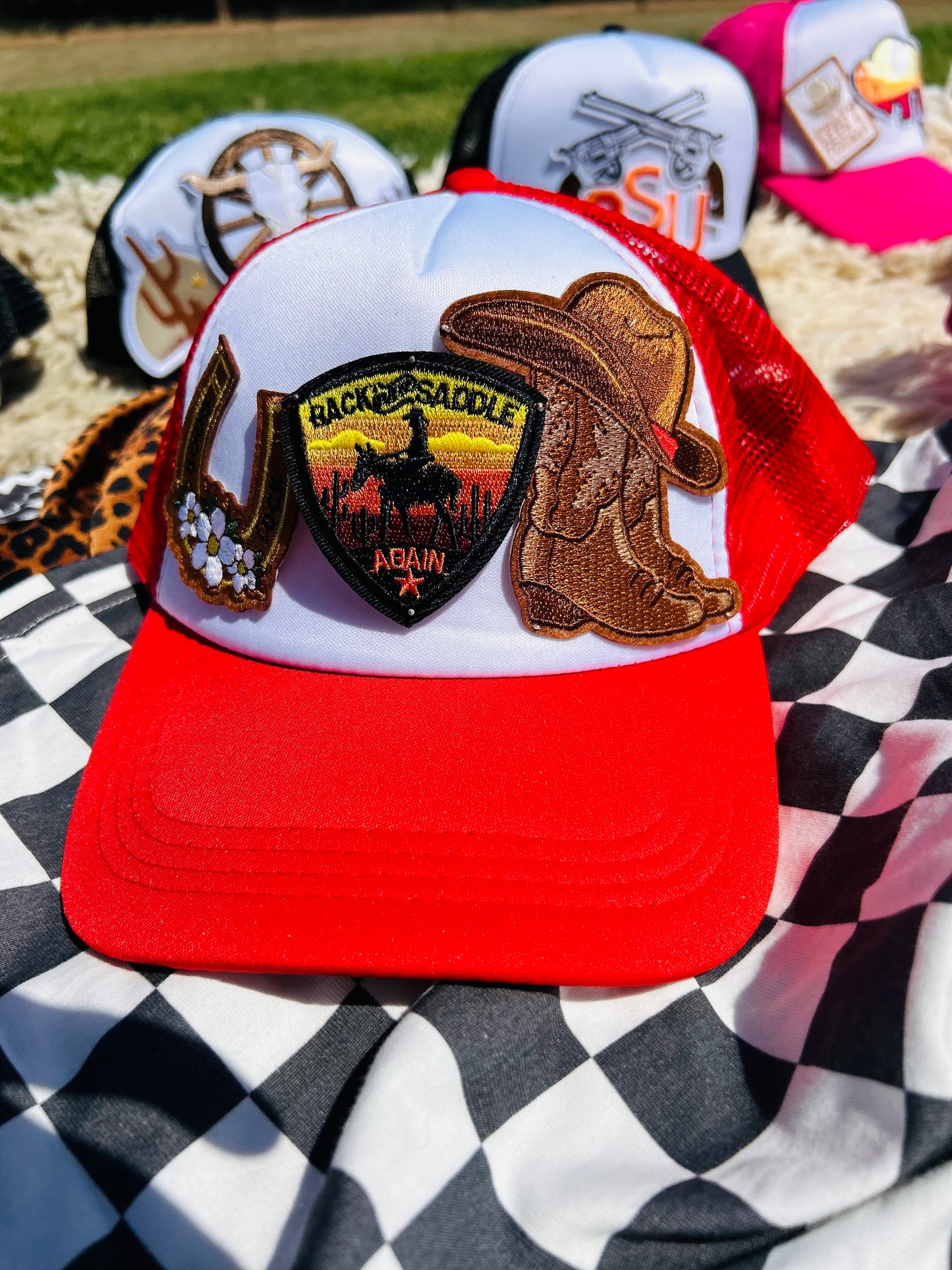 “Back in the Saddle” Trucker Hat in Red