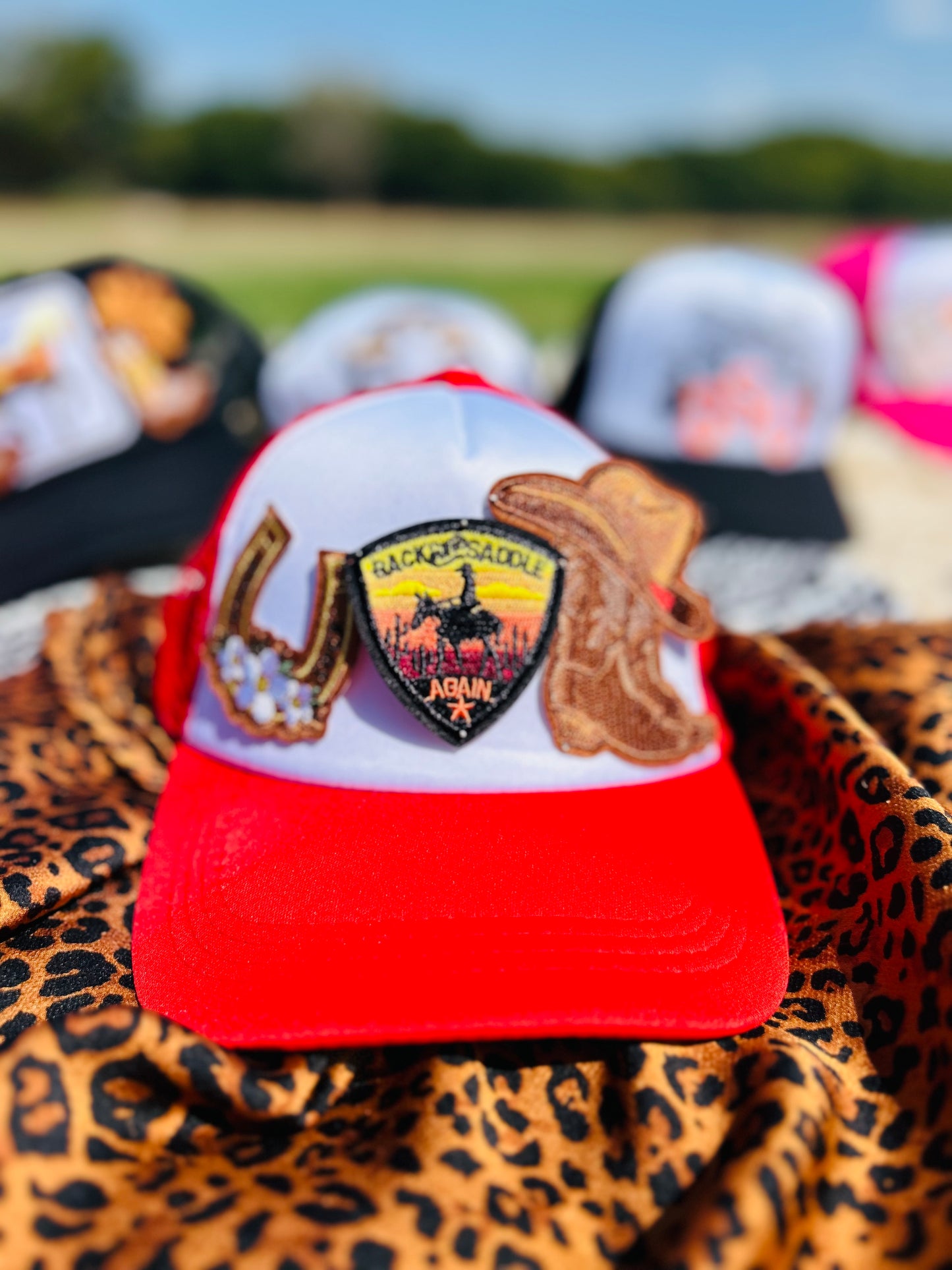 “Back in the Saddle” Trucker Hat in Red