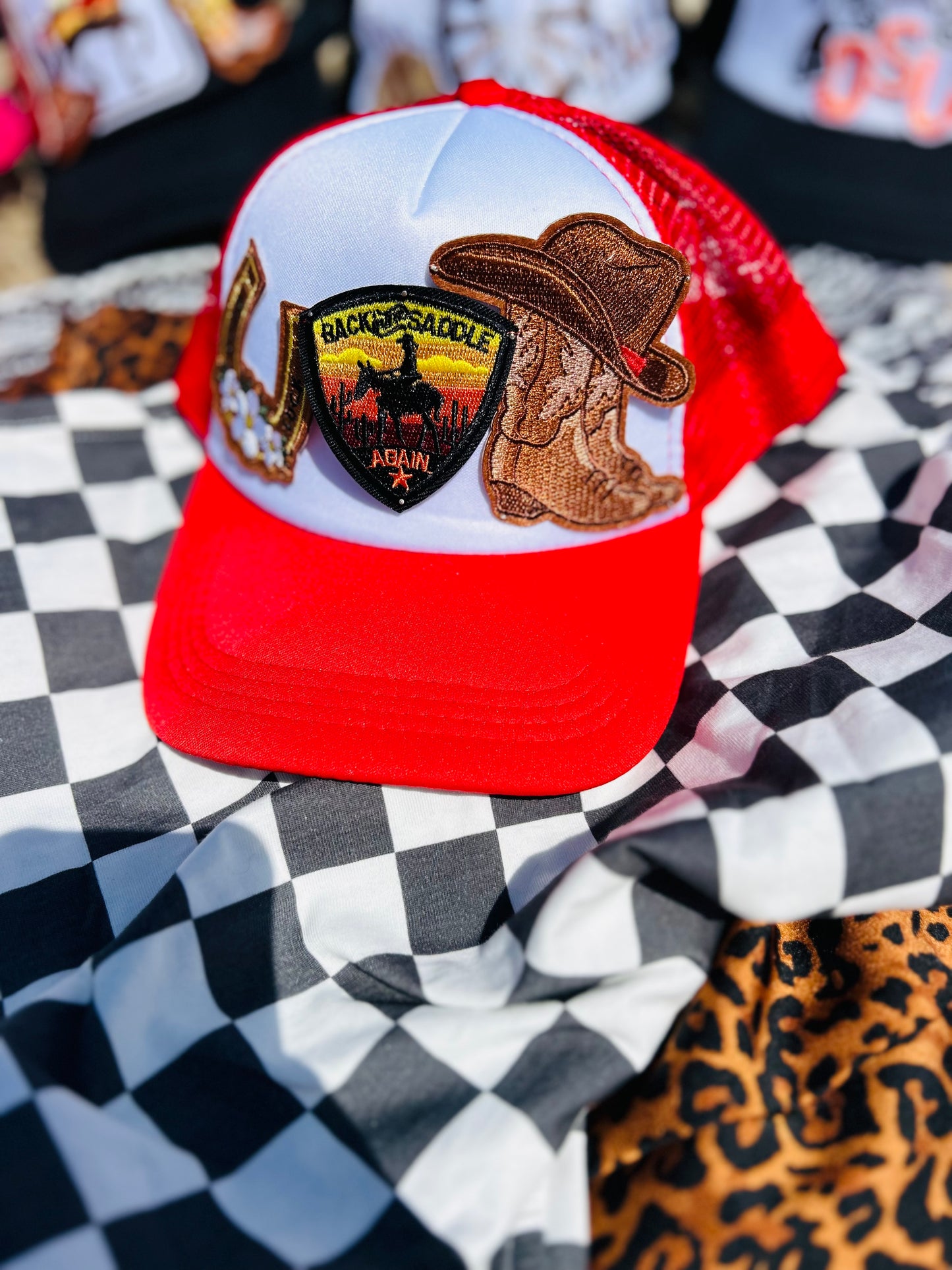 “Back in the Saddle” Trucker Hat in Red