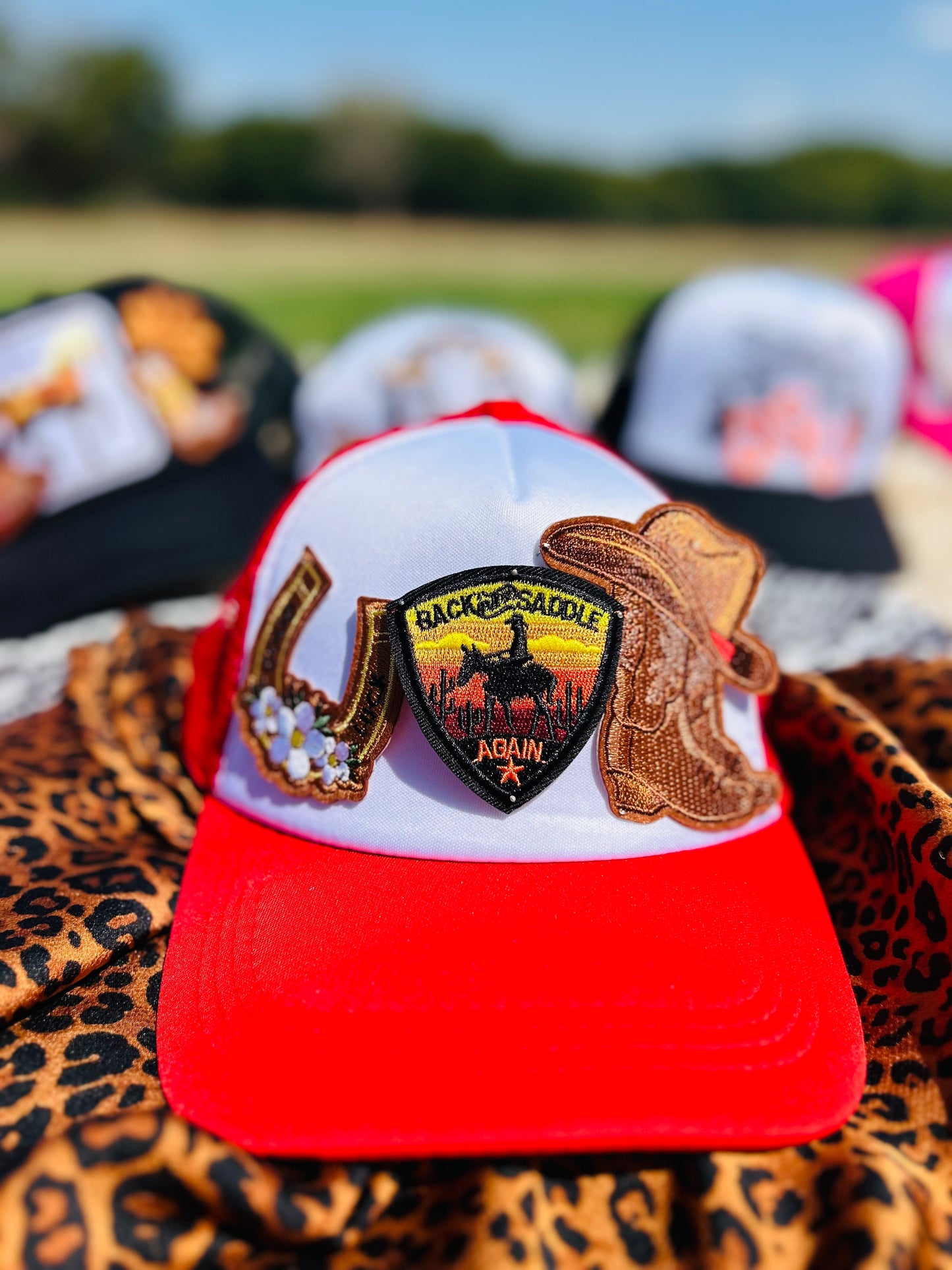 “Back in the Saddle” Trucker Hat in Red