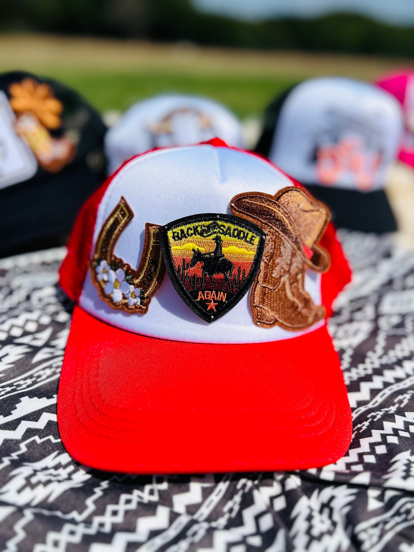 “Back in the Saddle” Trucker Hat in Red