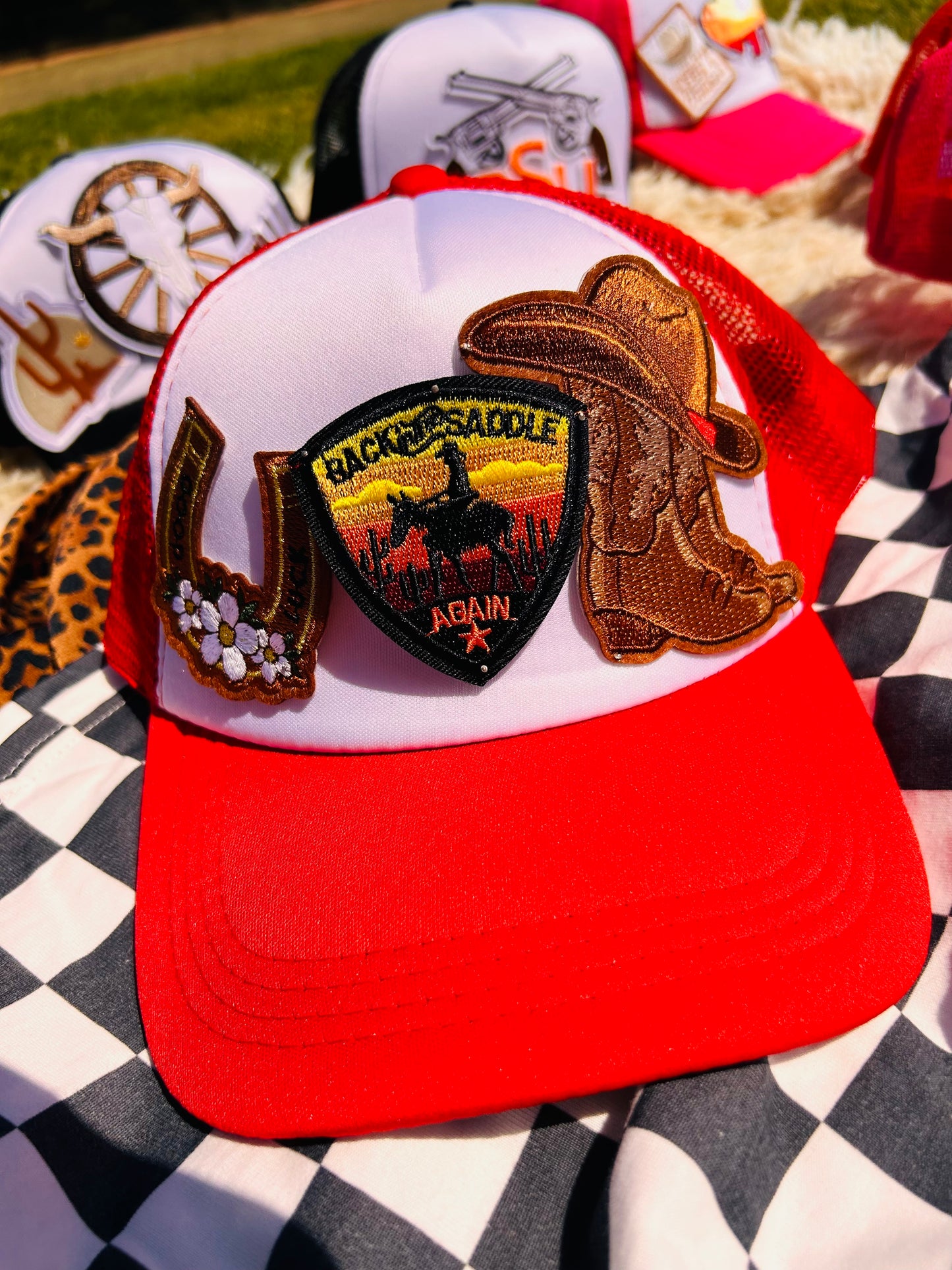 “Back in the Saddle” Trucker Hat in Red