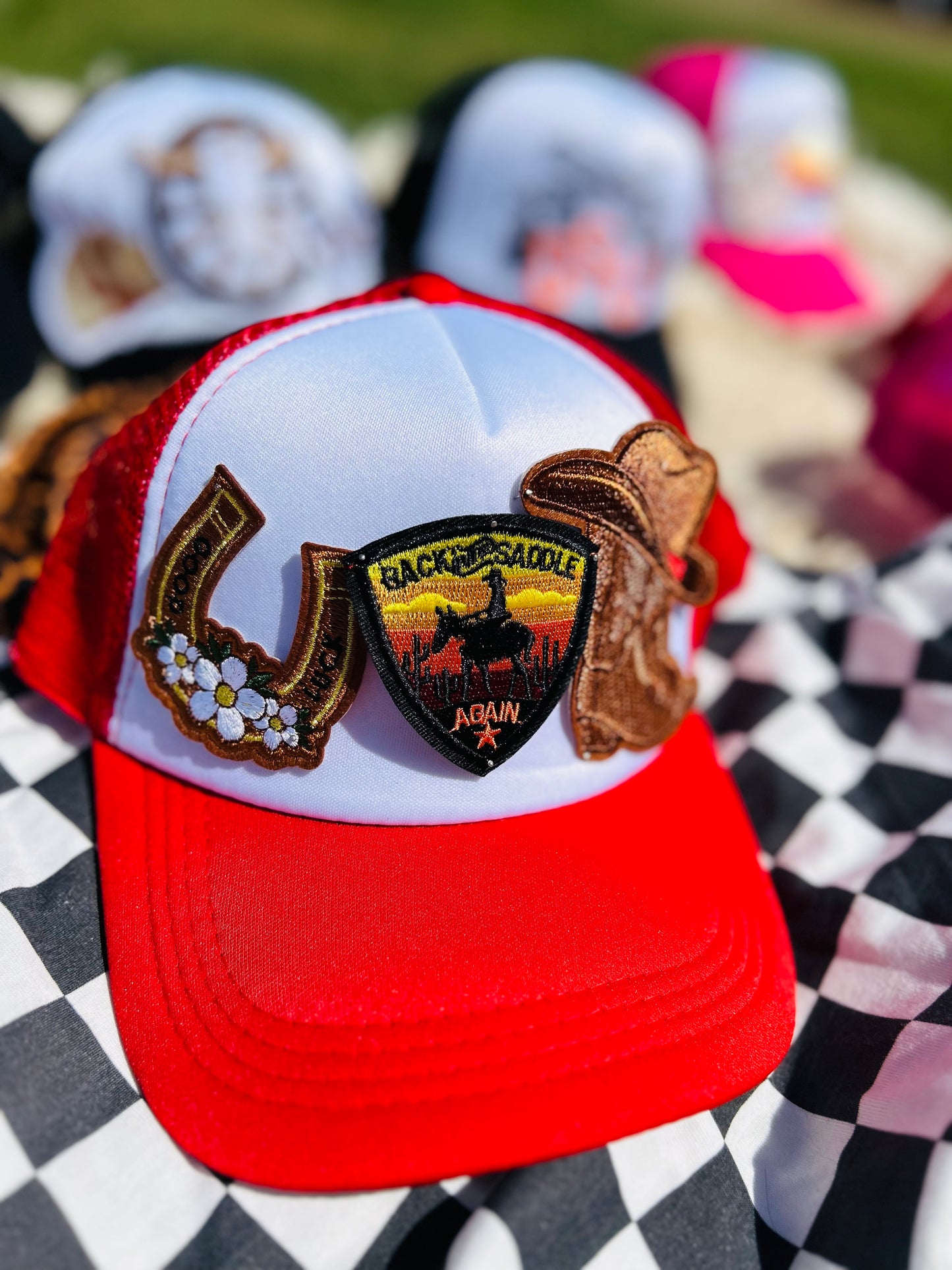 “Back in the Saddle” Trucker Hat in Red