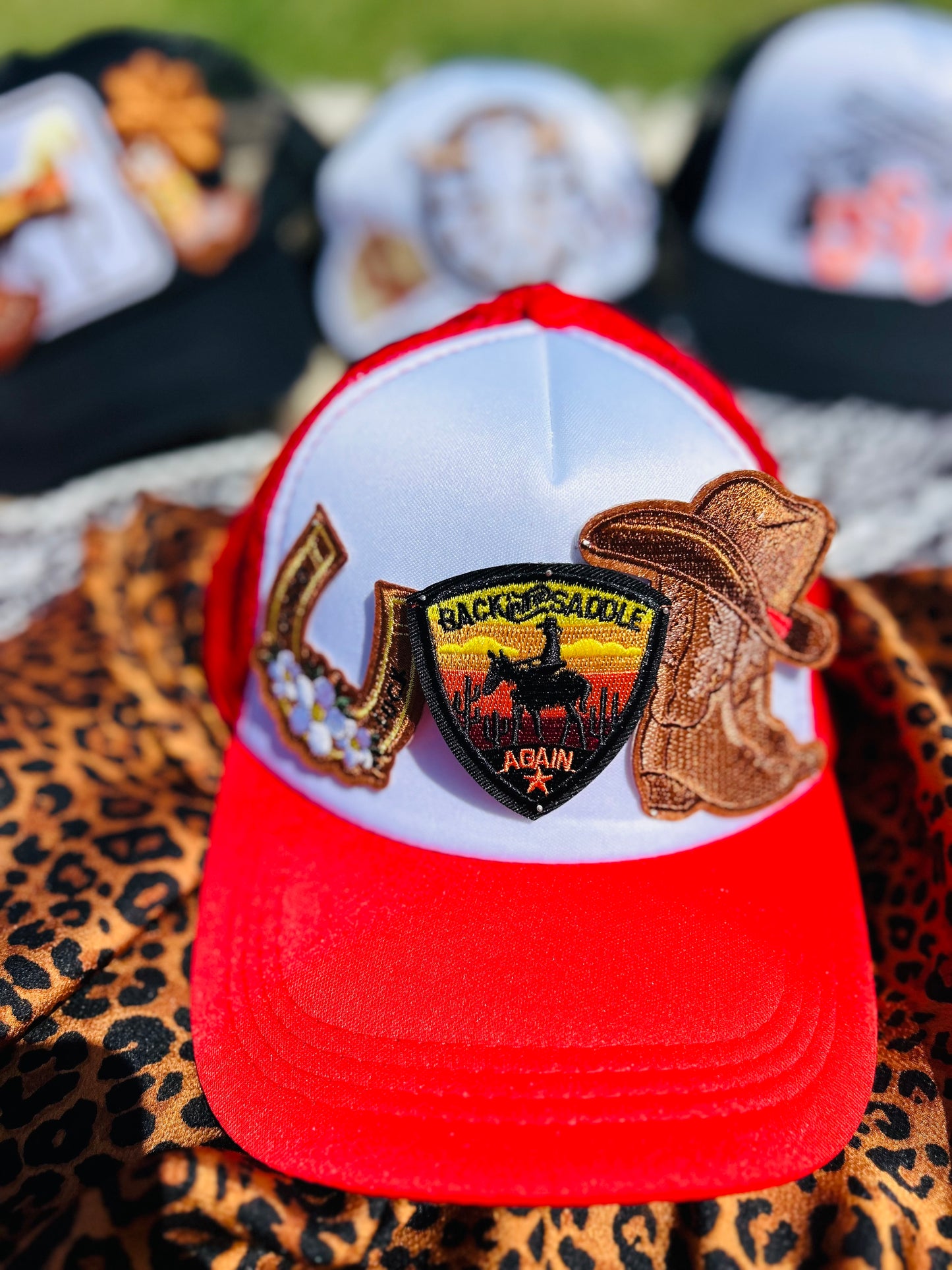 “Back in the Saddle” Trucker Hat in Red