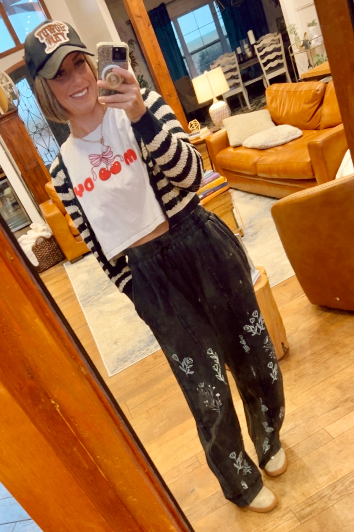 “I can buy myself flowers” barrel jeans in black