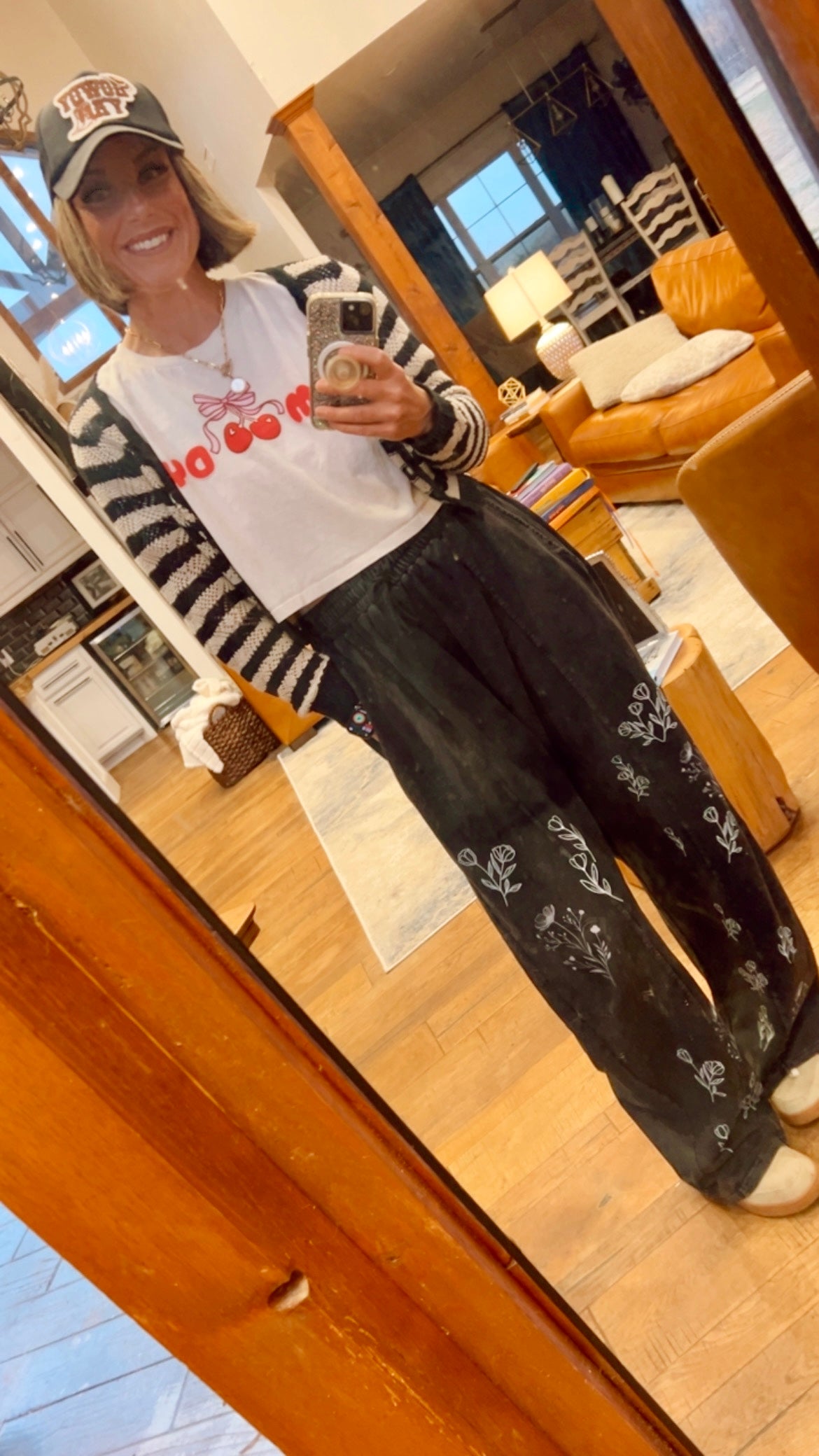 “I can buy myself flowers” barrel jeans in black