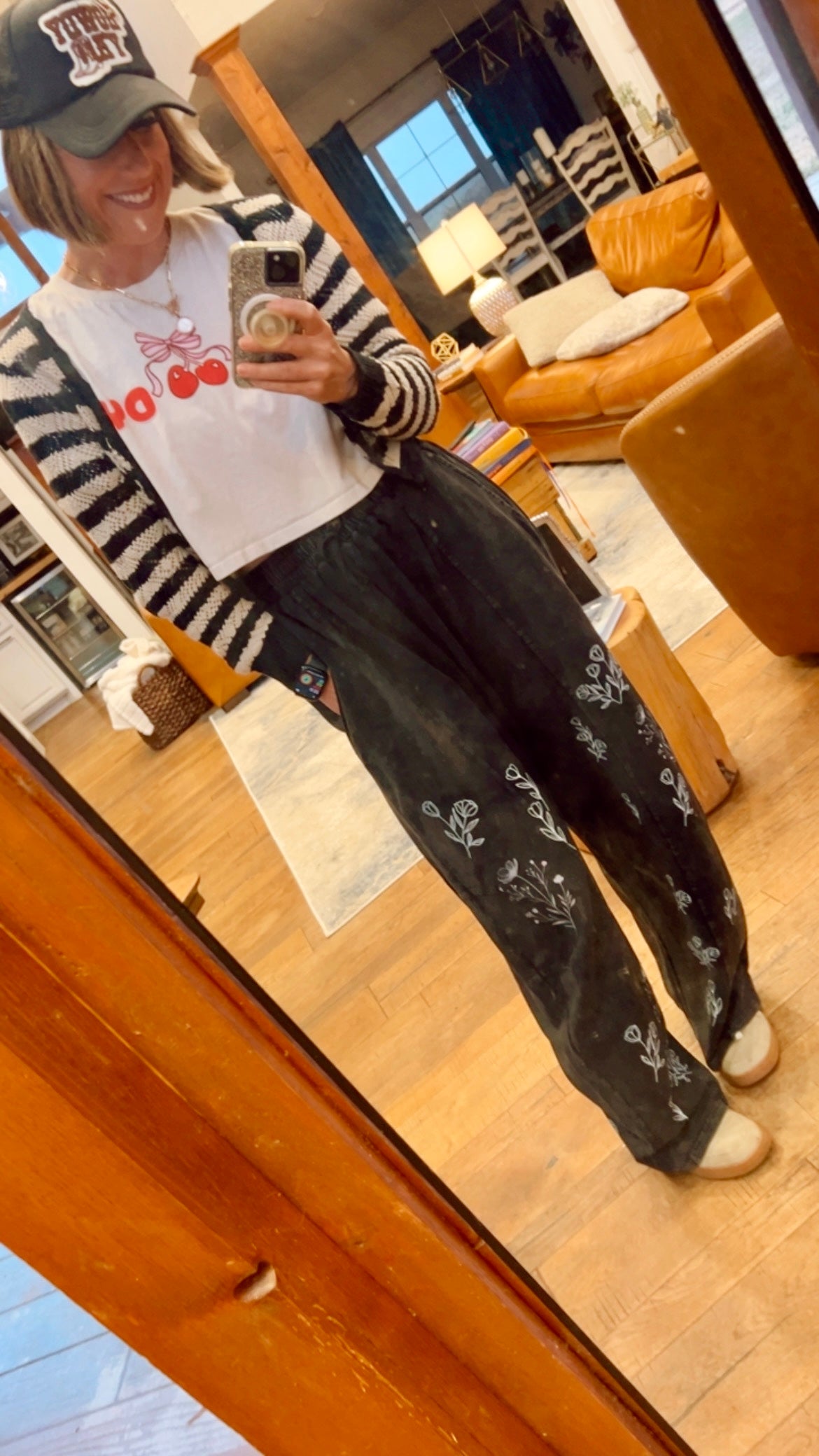 “I can buy myself flowers” barrel jeans in black