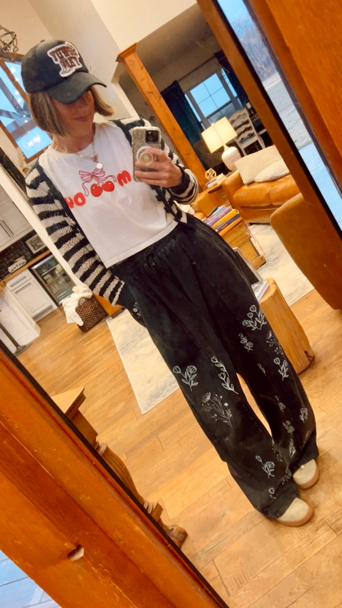 “I can buy myself flowers” barrel jeans in black