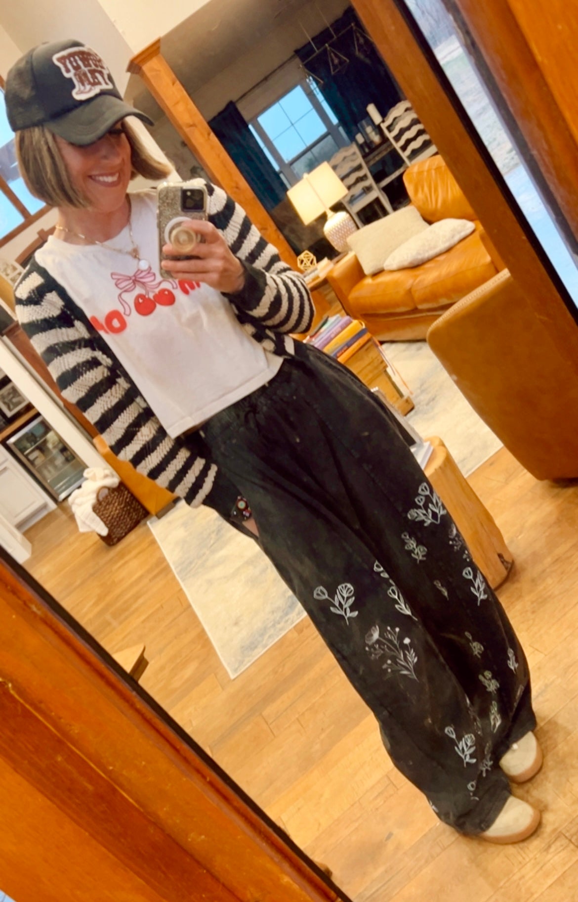 “I can buy myself flowers” barrel jeans in black