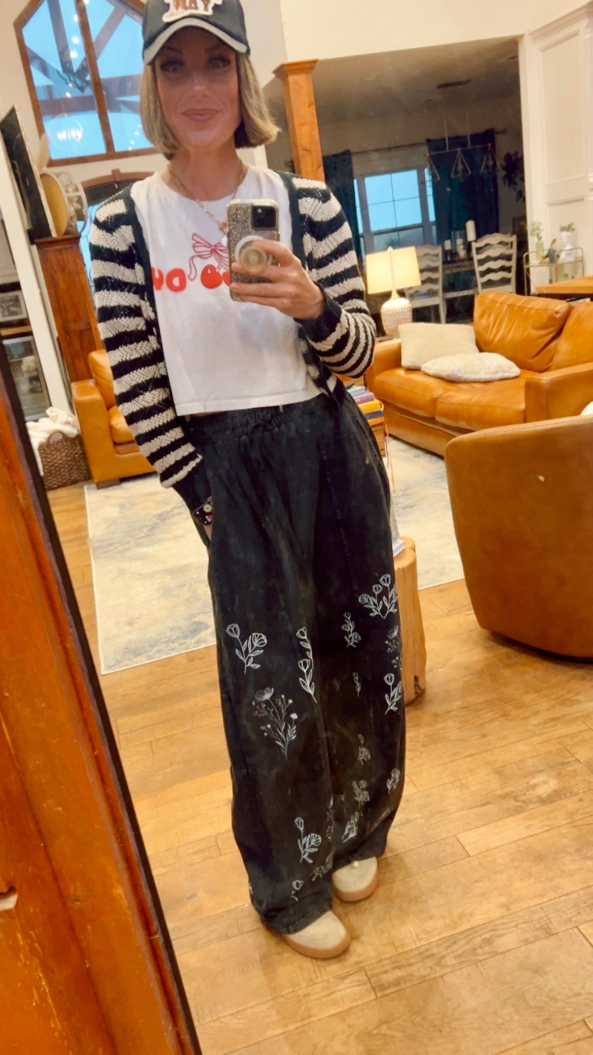 “I can buy myself flowers” barrel jeans in black