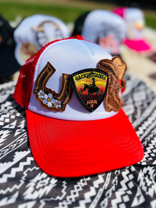 “Back in the Saddle” Trucker Hat in Red